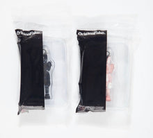 Load image into Gallery viewer, KAWS -“ Accomplice keychain” (pink) (black) (2